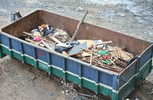 Skip hire truck at a Rotherhithe street, overview image