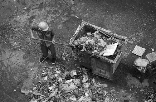 Skip Hire Rotherhithe team preparing a skip for delivery