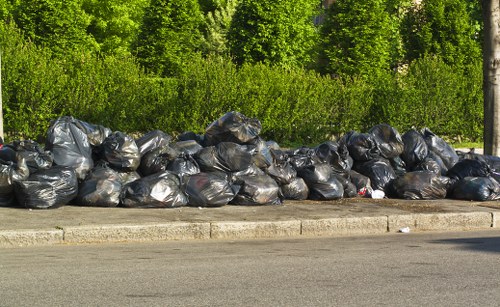 Workers handling construction debris
