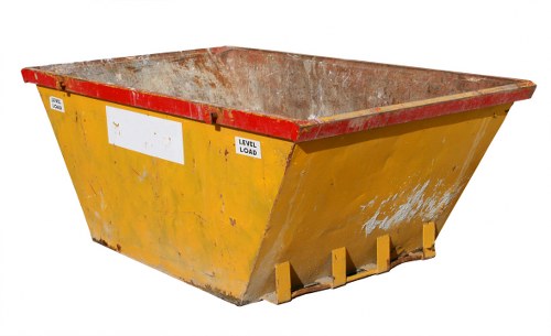 Professional team performing construction waste clearance